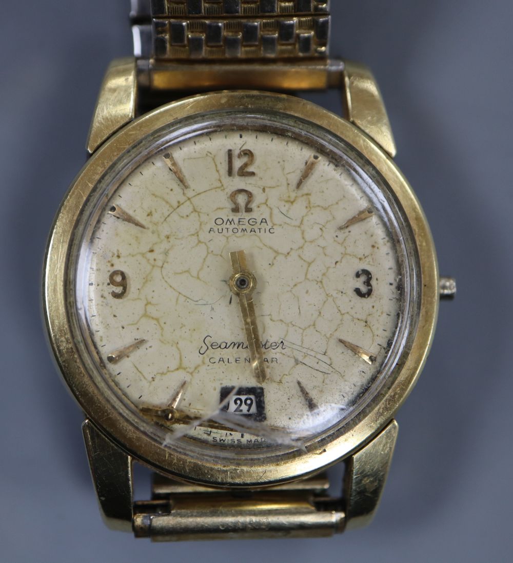 A gentlemans 1950s steel and gold plated Omega Seamaster Calendar Automatic wrist watch, movement c. 355,